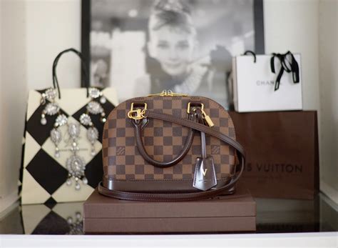 louis vuitton alma review